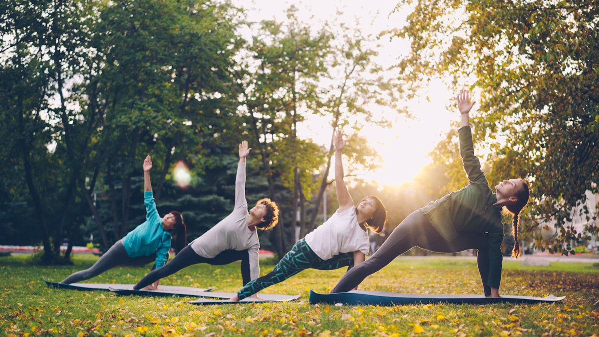 Team members practicing yoga together